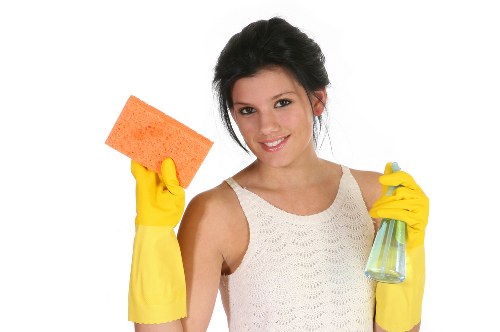 Worker preparing cleaning materials and checking equipment